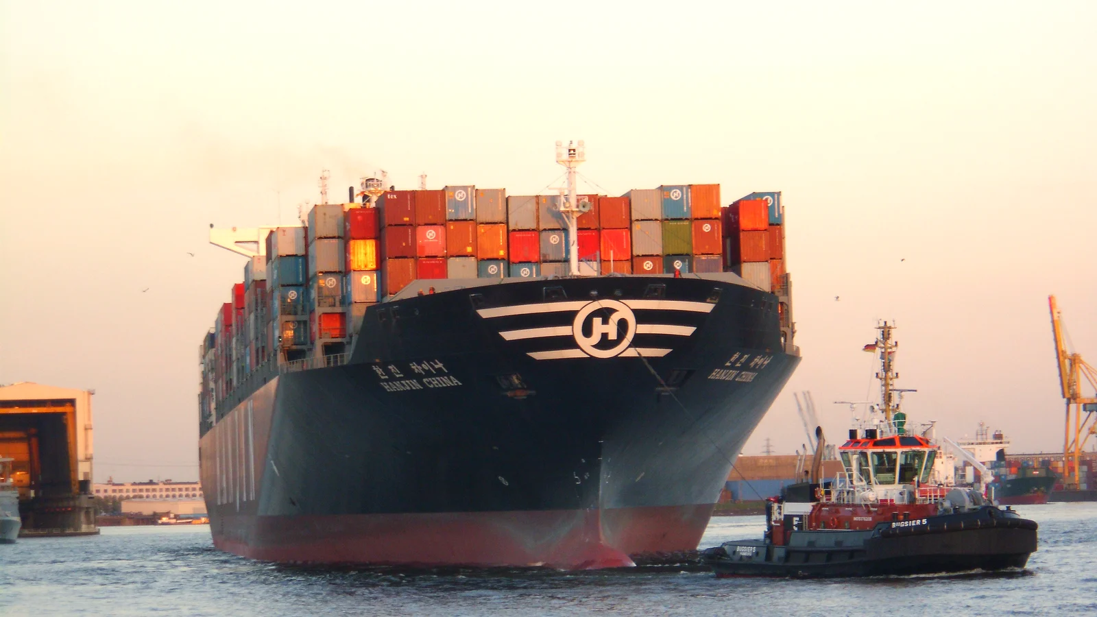 Container ship Hanjin China with stacked containers in the port of Hamburg