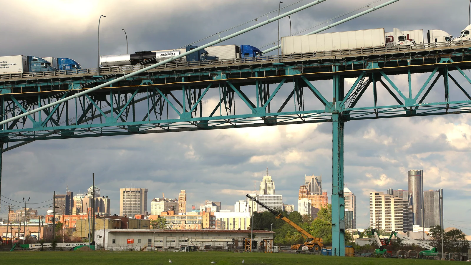 Trucks queue on a bridge at the Detroit-Windsor border crossing