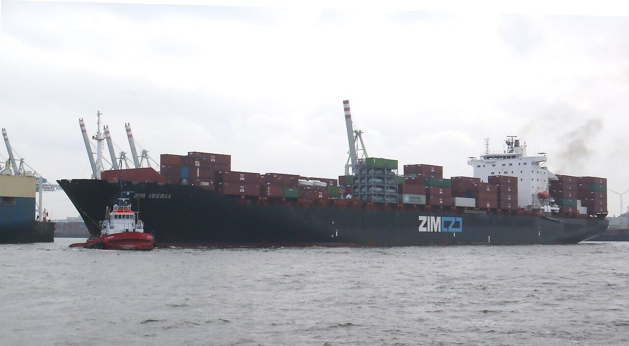 Container ship ZIM Iberia, turning maneuvers on portside bow in the port of Hamburg
